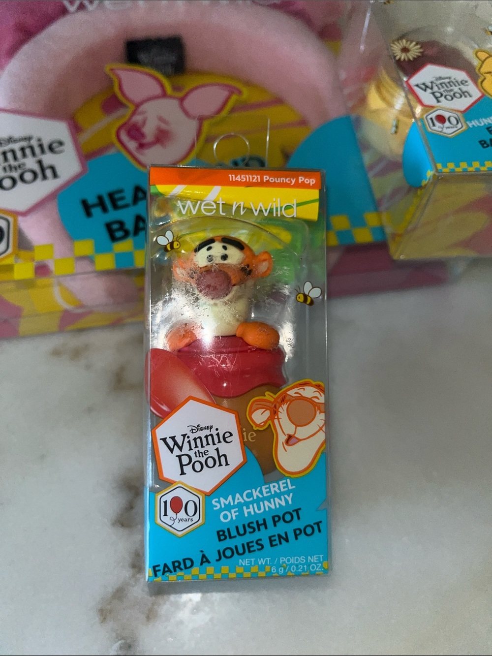 wet n wild blush pot - red and orange Tigger topper